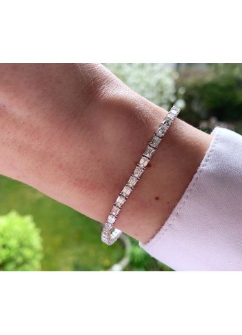 Exquisites Tennis Armband mit Diamanten im Smaragdschliff