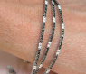 Dreireihiges Tennisarmband mit schwarzen und weißen Diamanten #2