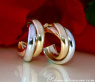 Gold pur: Verschlungene Gold Creolen "Tricolor" #1