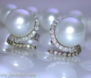 Southsea Pearl Studs with white & brown Diamonds Southsea Pearl Studs with white & brown Diamonds