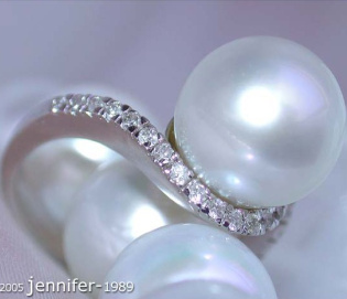 Eleganter Südseeperle Ring mit braunen & weiße Brillanten Eleganter Südseeperle Ring mit braunen & weiße Brillanten