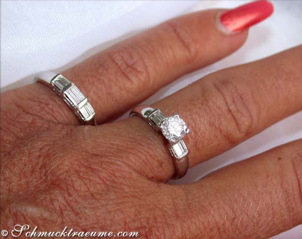 Weißgold-Brillant Solitär-Ring mit Diamant-Beisteck, elegant auf der Hand getragen.