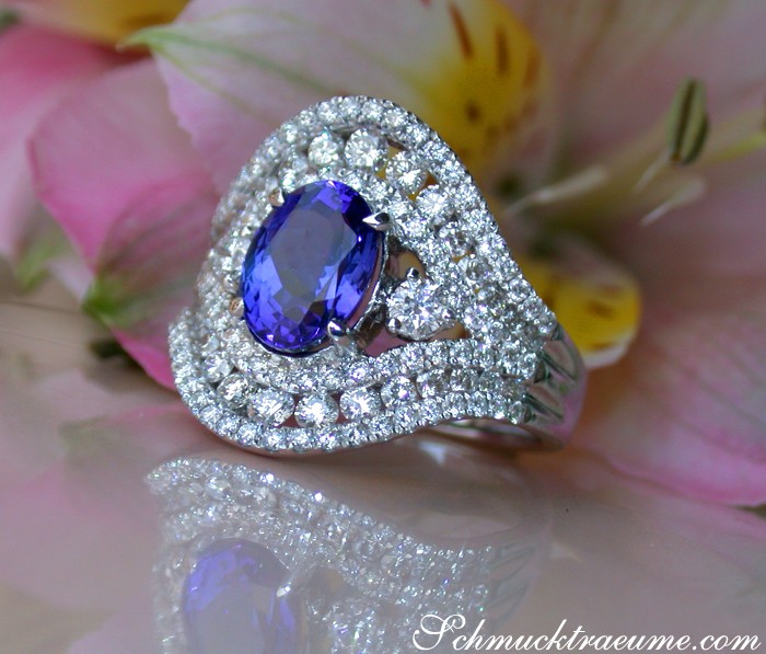 Weißgold-Tansanit-Ring mit 3.000 Karat, ovaler Schliff, Diamant-Halo
