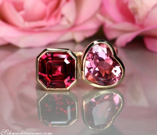 Pink Turmalin Herz und Rhodolith-Ring in Gelbgold 585, prächtig auf glänzender Oberfläche.