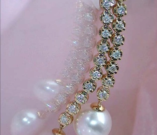 Extra lange Südseeperlen Ohrgehänge mit Brillanten, Traumhaftes Design, femininer Charme