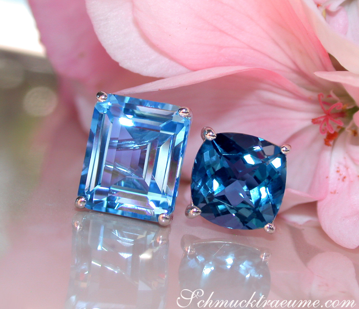 Blautopas-Ringe in Weißgold, detailreich, vor Rosenblüte