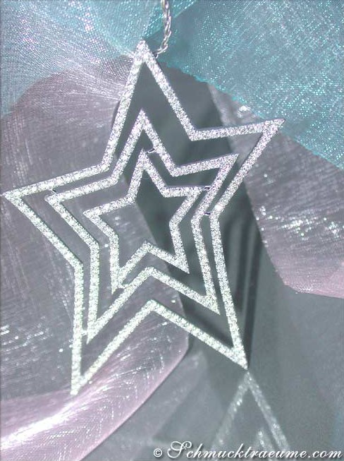 Glitzernder Diamant-Stern-Anhänger aus Weißgold, Detailaufnahme, strahlend und elegant