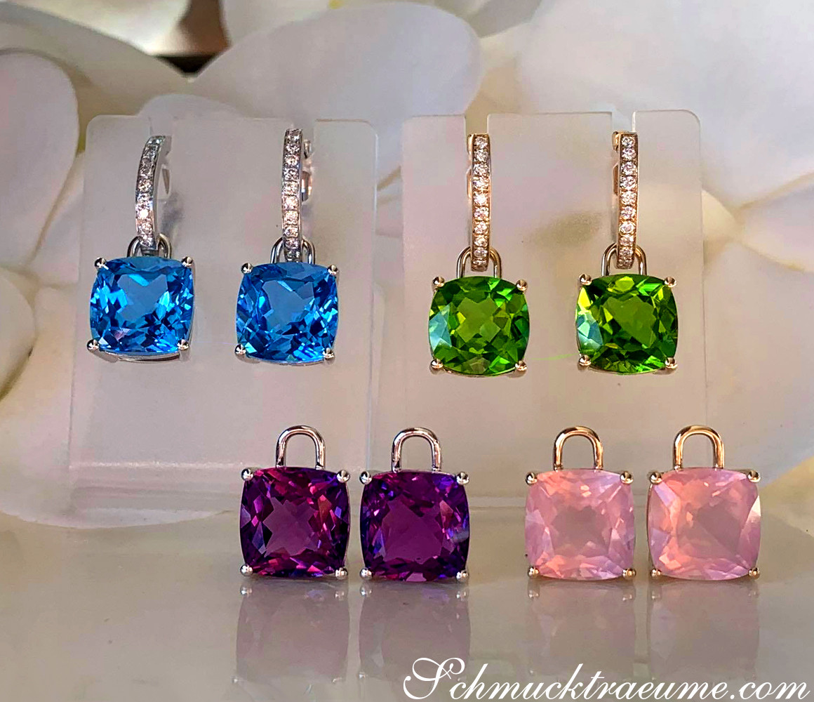 Vielfarbige Wende-Ohrhänger mit Rosenquarz und Diamanten, elegant auf weißem Hintergrund präsentiert.