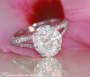 Weißgoldring mit ovalen Diamanten auf rosafarbenem Hintergrund