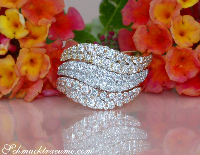 Schöne Brillanten-Ringe aus Gelb-, Rosé- & Weißgold 750, drei geschwungene Schmuckstücke