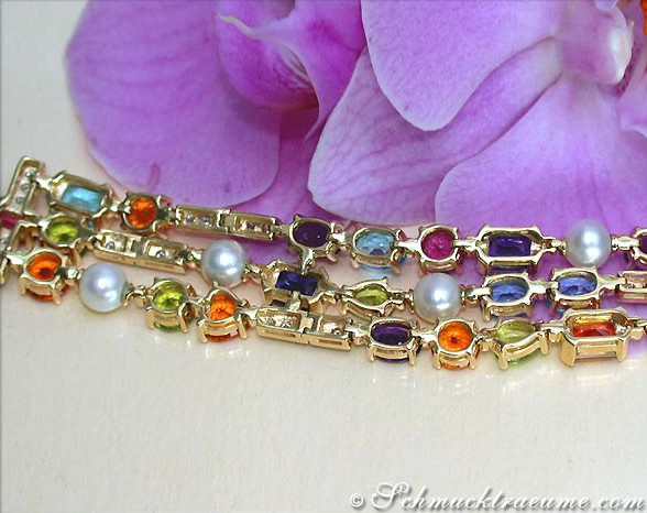 Exquisites Multicolor Edelstein-Armband mit Diamanten & Perlen vor Orchideenblüte