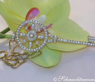 Orchideenblüte mit brillantenschmückendem Schlüsselanhänger aus Gelbgold 750