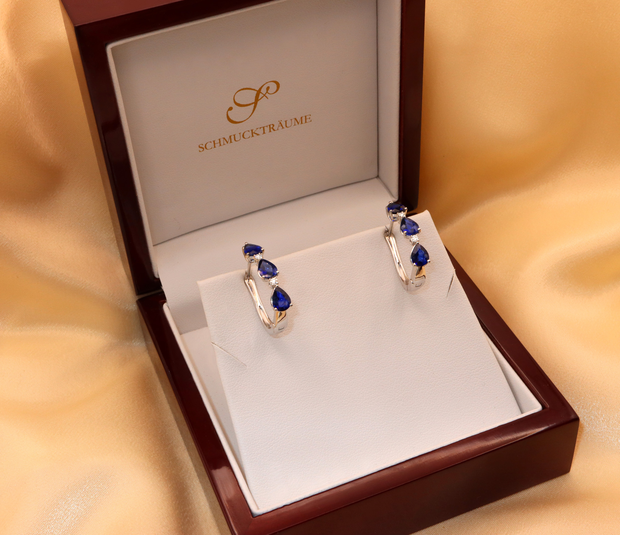 Schmuckträume: Elegante Saphir-Tropfenohrringe mit Brillanten in Weißgold 750