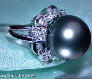 Tahitiperlen-Ring in Weißgold mit Baguette- und Brillant-Diamanten