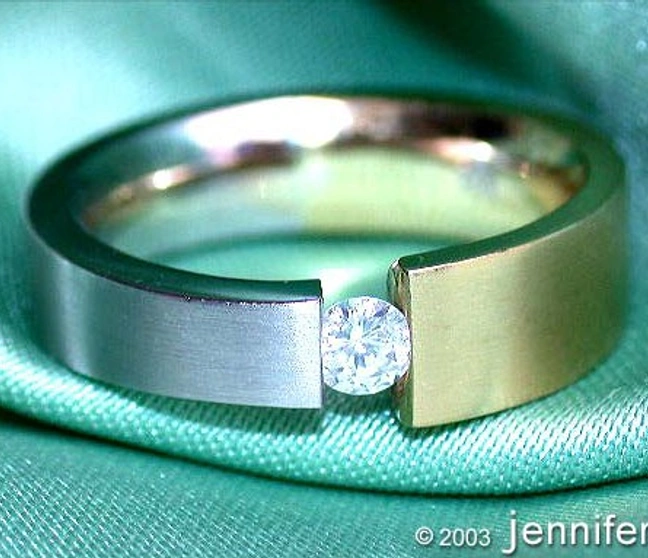 Attraktiver Brillant Solitär Spannring in Bicolor-Fertigung - Image 1 Attraktiver Brillant Solitär Spannring in Bicolor-Fertigung - Image 1