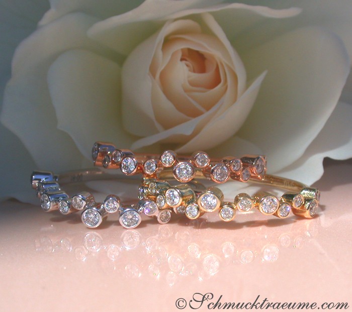 Detailansicht von drei Diamanten Memory Ringen aus Weiß-, Gelb- & Roségold 585